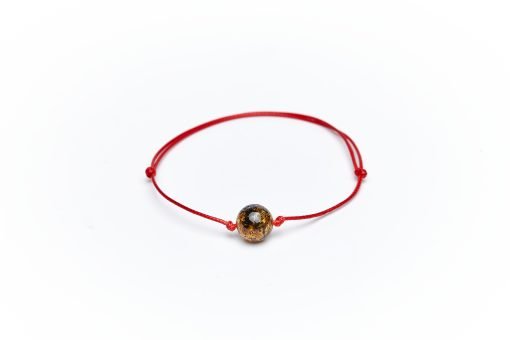 Amber bracelet red string green