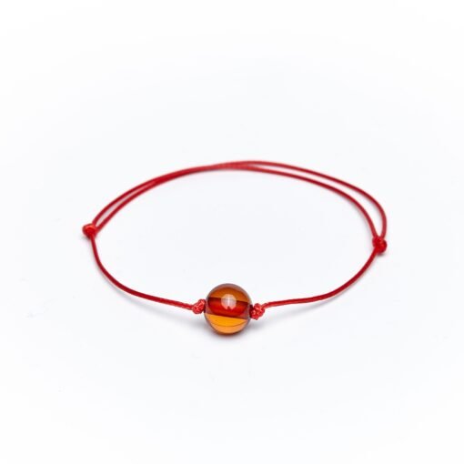 Amber bracelet red string cognac