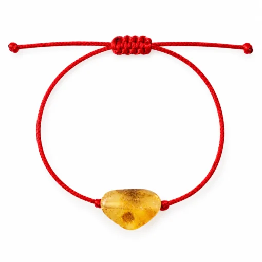 Red string bracelet with raw amber